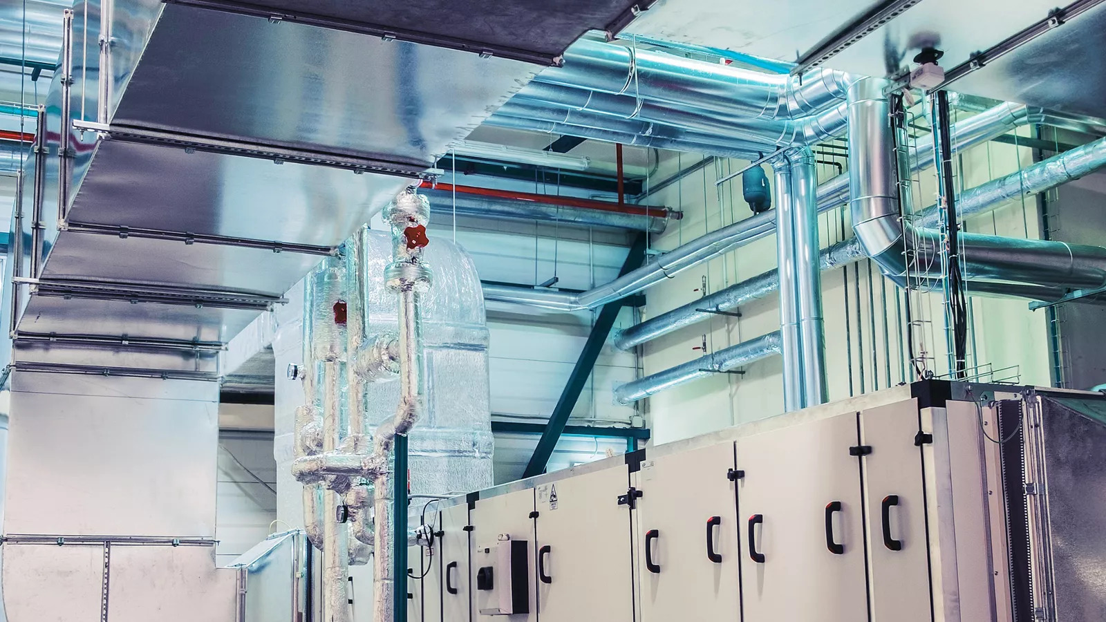 Coordinated mechanical electrical and plumbing systems in a commercial building